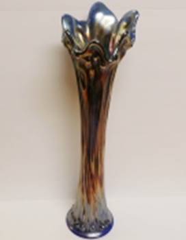 A close-up of a vase

AI-generated content may be incorrect.