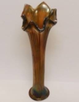 A close-up of a vase

AI-generated content may be incorrect.