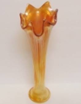 A close-up of a vase

AI-generated content may be incorrect.