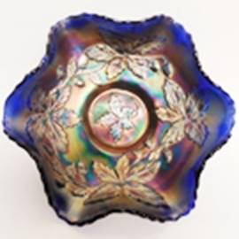 A blue and gold glass bowl

AI-generated content may be incorrect.