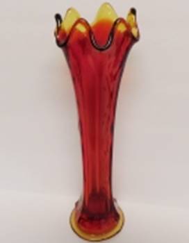 A red and yellow vase

AI-generated content may be incorrect.
