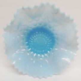 A close-up of a blue and white bowl

AI-generated content may be incorrect.