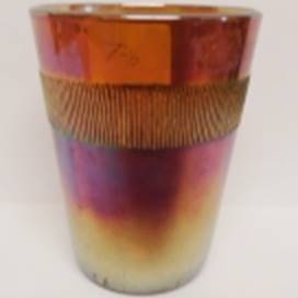 A glass with a gold rim

AI-generated content may be incorrect.