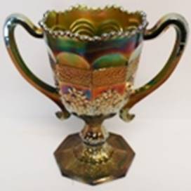 A gold and green trophy

AI-generated content may be incorrect.