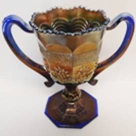 A close up of a trophy

AI-generated content may be incorrect.