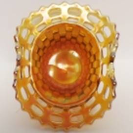 A close up of a gold object

AI-generated content may be incorrect.