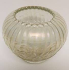 An orange glass bowl

AI-generated content may be incorrect.