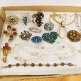 A box with jewelry in it

AI-generated content may be incorrect.