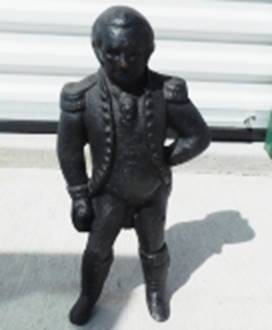 A statue of a person

AI-generated content may be incorrect.