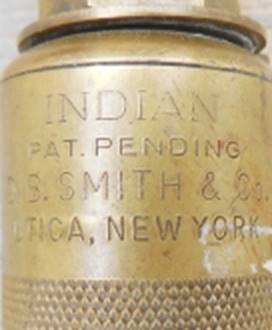 A close up of a brass container

AI-generated content may be incorrect.