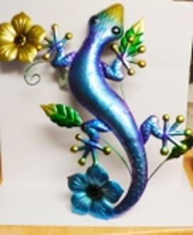 A blue lizard with green leaves and flowers

AI-generated content may be incorrect.