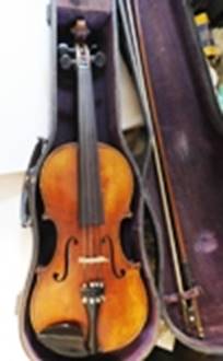 A violin in a case

AI-generated content may be incorrect.