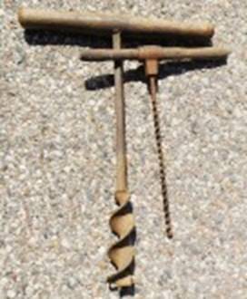 A drill bit on the ground

AI-generated content may be incorrect.