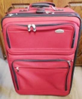 A red suitcase with zippers

AI-generated content may be incorrect.