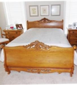 A bed with a white sheet

AI-generated content may be incorrect.