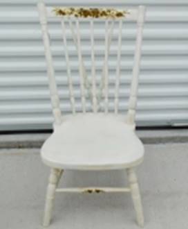 A white chair in front of a white wall

AI-generated content may be incorrect.