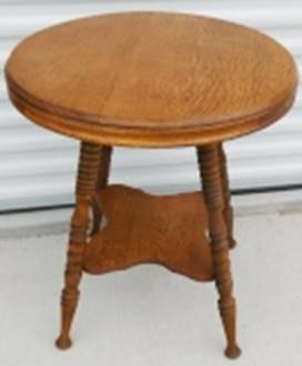 A round wooden table with legs

AI-generated content may be incorrect.