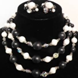 A necklace and earrings on a mannequin

AI-generated content may be incorrect.
