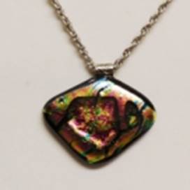 A necklace with a colorful stone

AI-generated content may be incorrect.