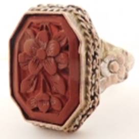 A close up of a ring

AI-generated content may be incorrect.