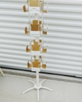A white and gold display stand

AI-generated content may be incorrect.